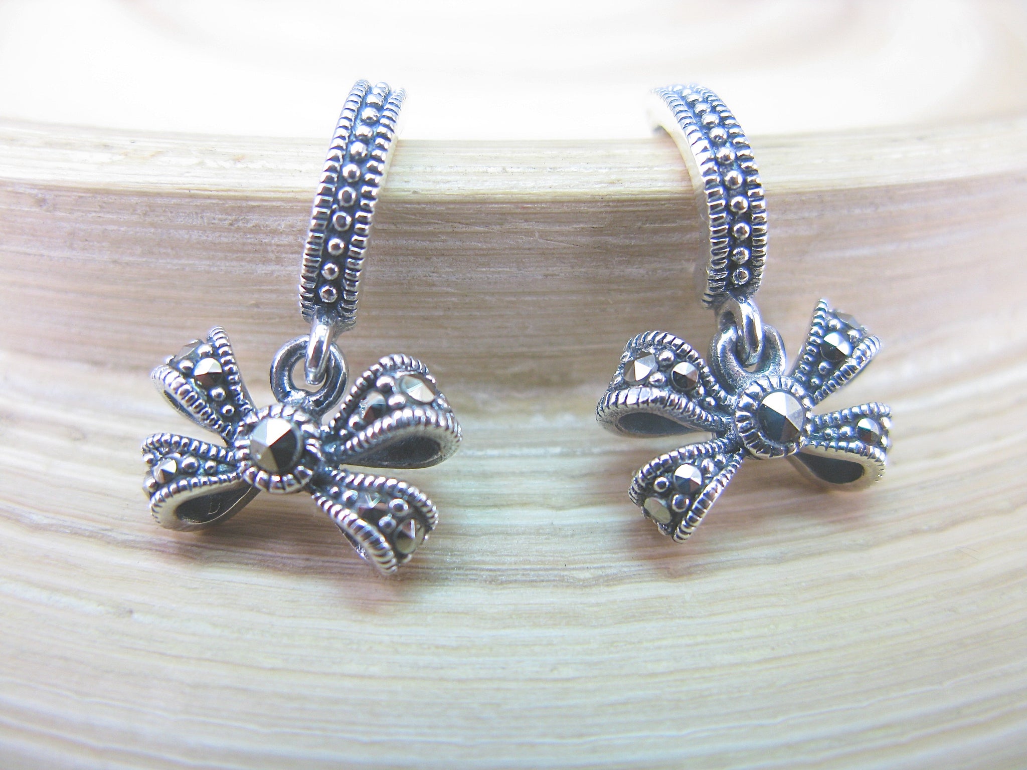Ribbon Marcasite Dangle Earrings in 925 Sterling Silver